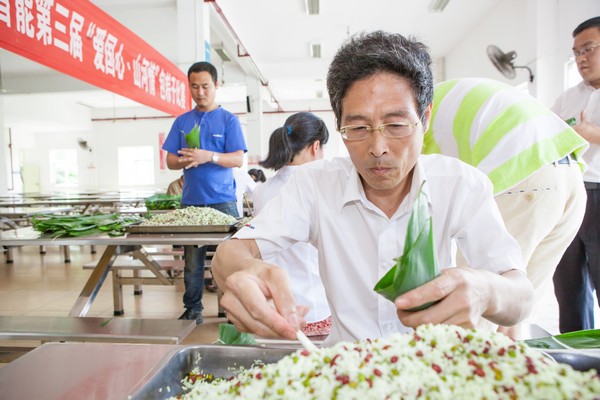 弘扬传统文化，共享浓情端午——记第三届“爱国心·米兰平台app体育-官方版-米兰电竞直播
情”包粽子比赛